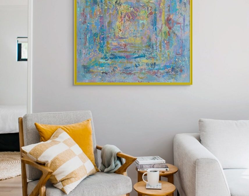 Framed abstract painting of the Kotel (Western Wall) in Jerusalem, with rich blues and vibrant colors symbolizing Jewish prayer, faith, and unity, displayed in a modern interior