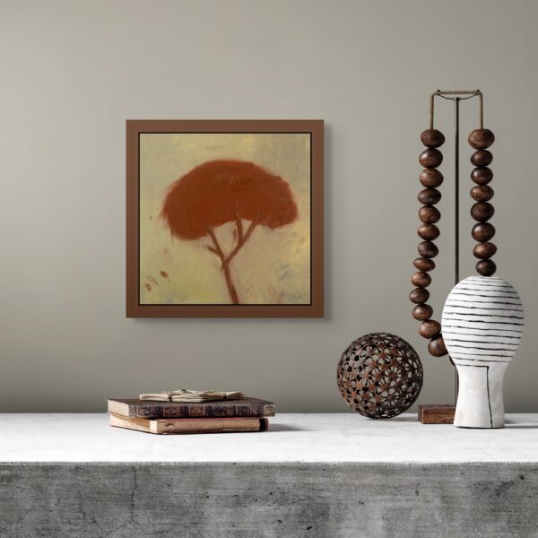 Framed primitive-style tree painting inspired by prehistoric cave art with visible fingerprints on canvas, displayed in a modern rustic interior